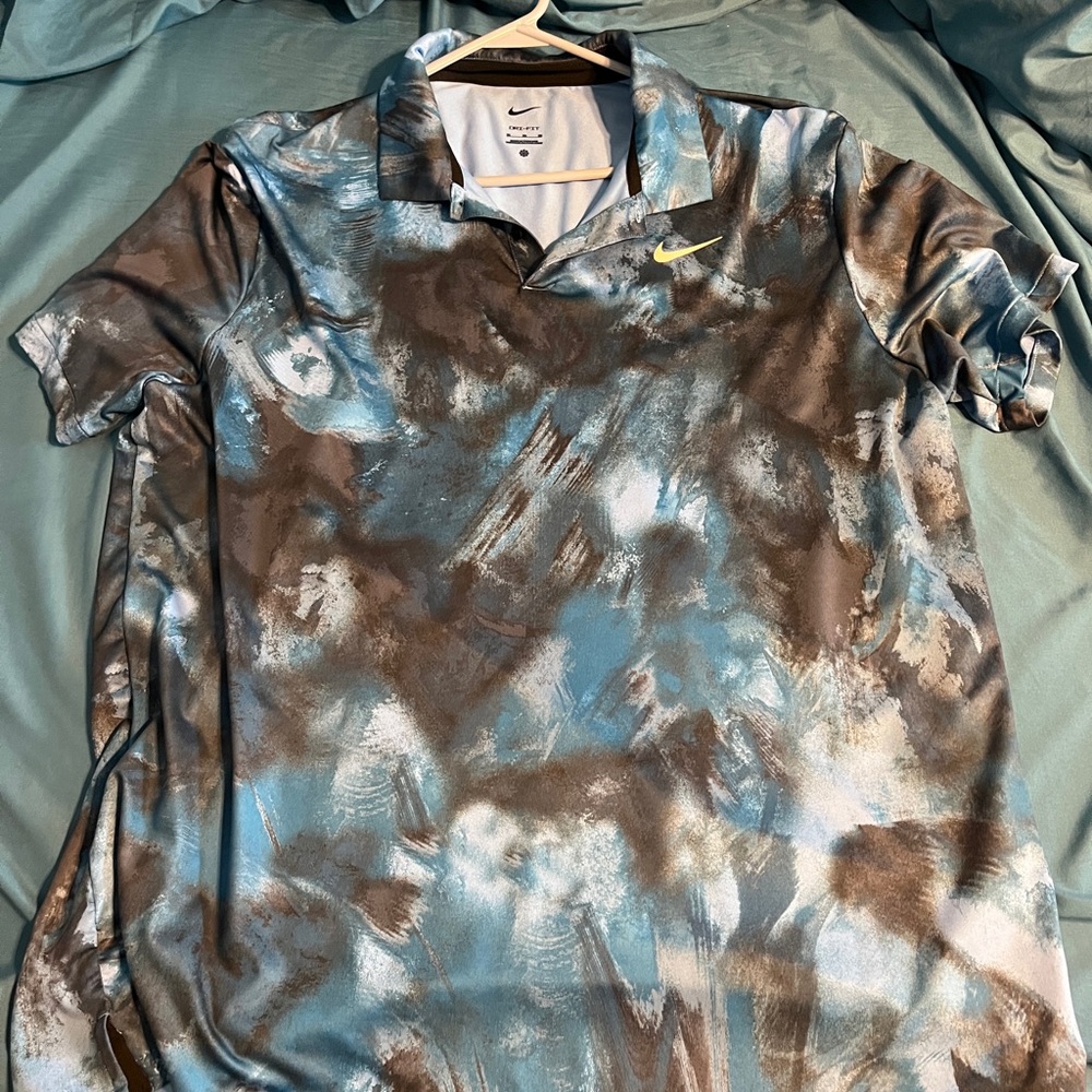 Nike Blue and Black Polo Shirt with Artistic Design